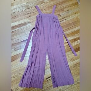Women’s Lou & Grey flowy blush colored jumpsuit with pockets.